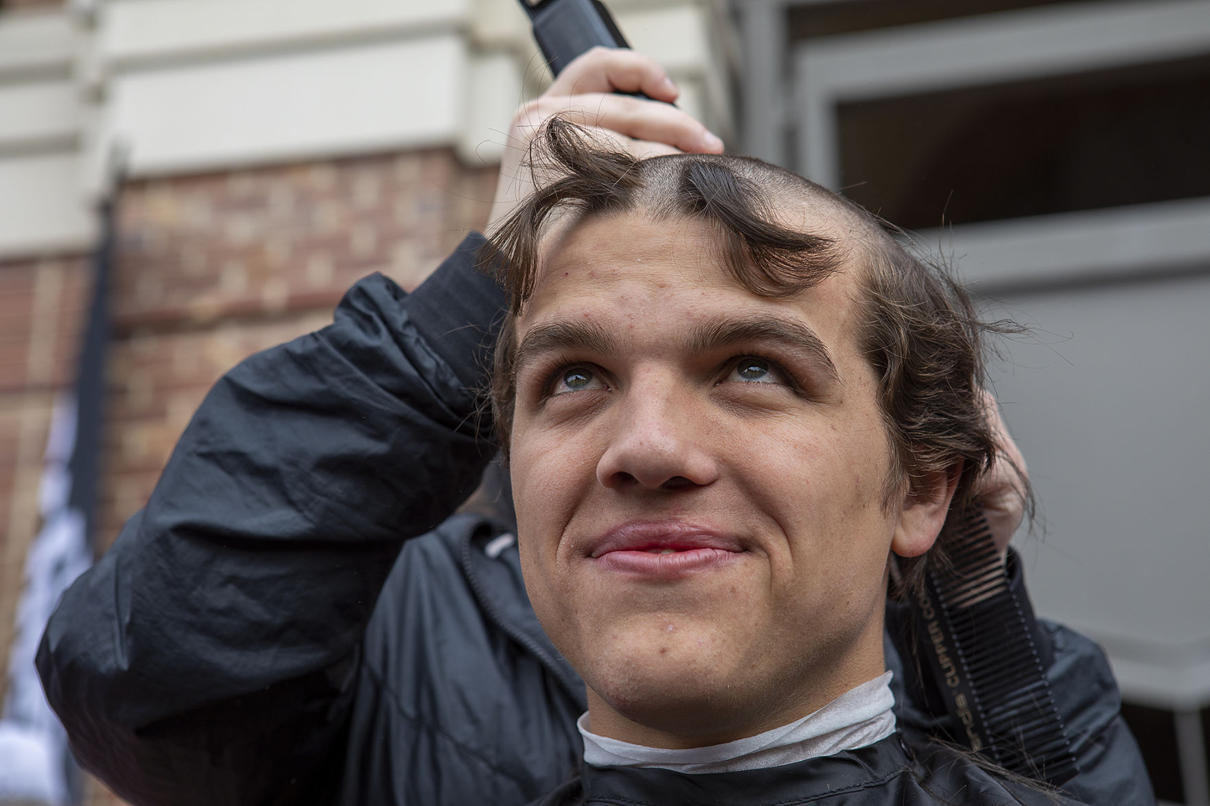 A&M baseball head shaving for cancer
